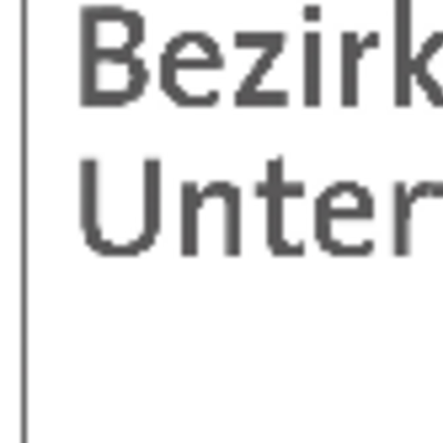 Bild vergr&ouml;&szlig;ern: Logo Bezirk Unterfranken, rotes Dreieck Spitze nach unten mit Schrift seitlich daneben Bezirk Unterfranken